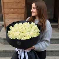 51 white roses in black wrapping Ri