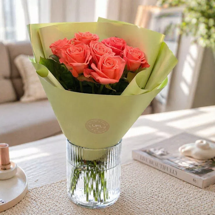 7 coral roses – flower delivery in Greifswald